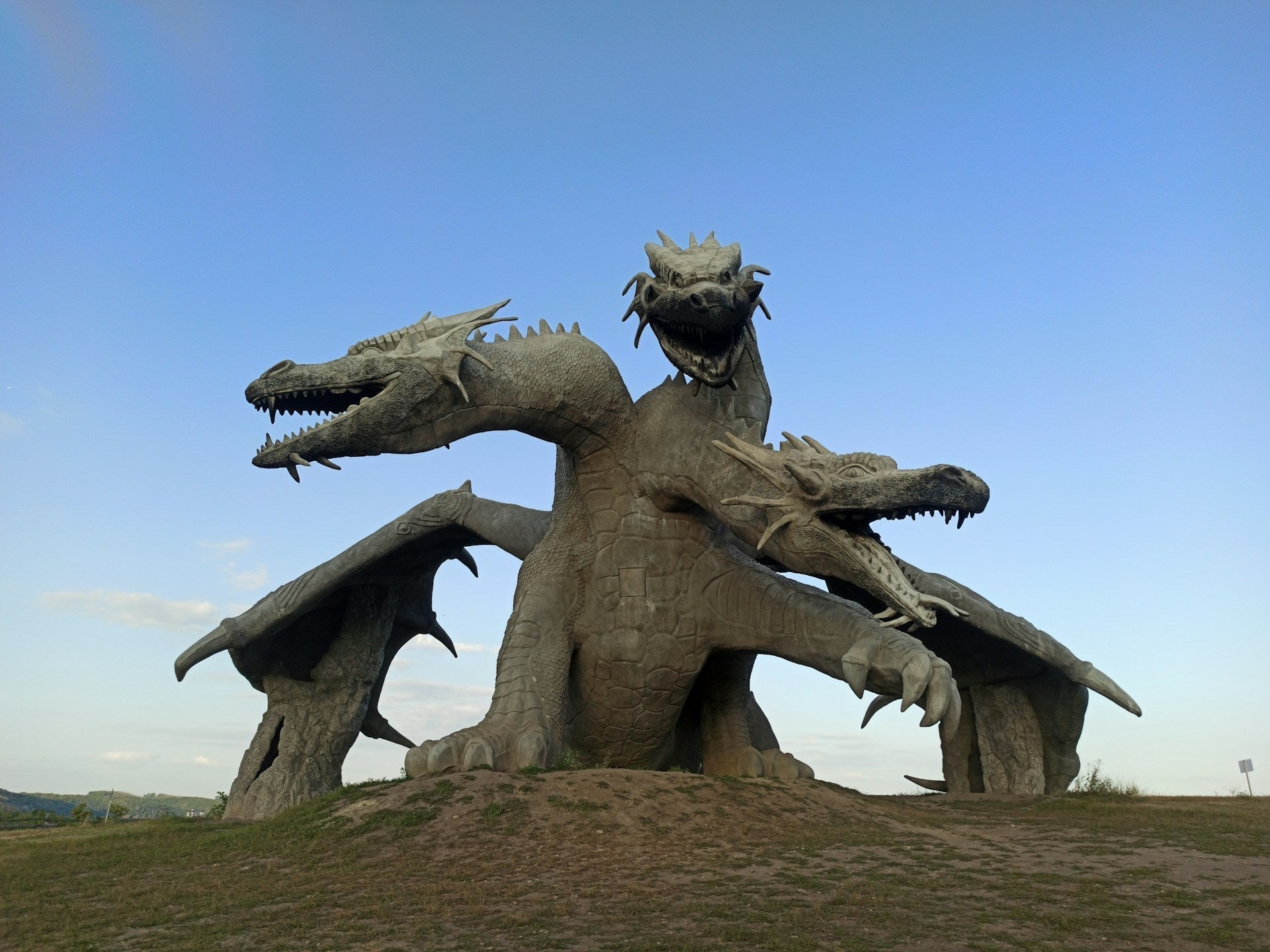 a statue of a three-headed dragon