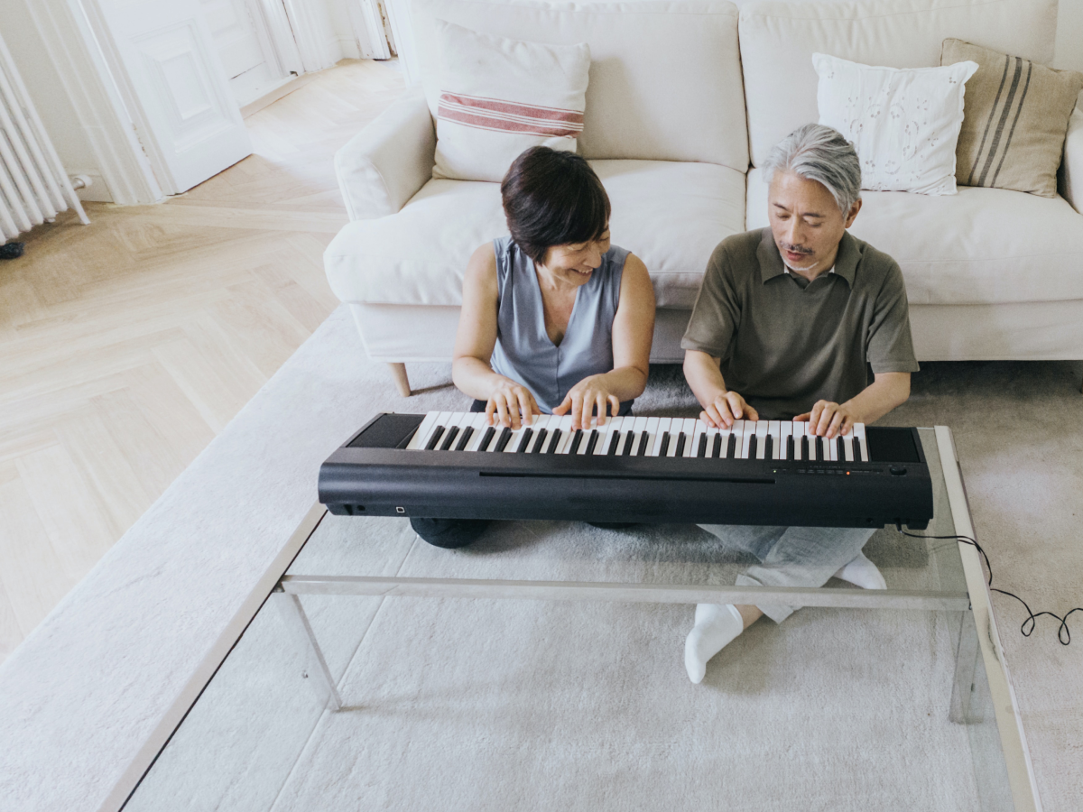 A couple making music together